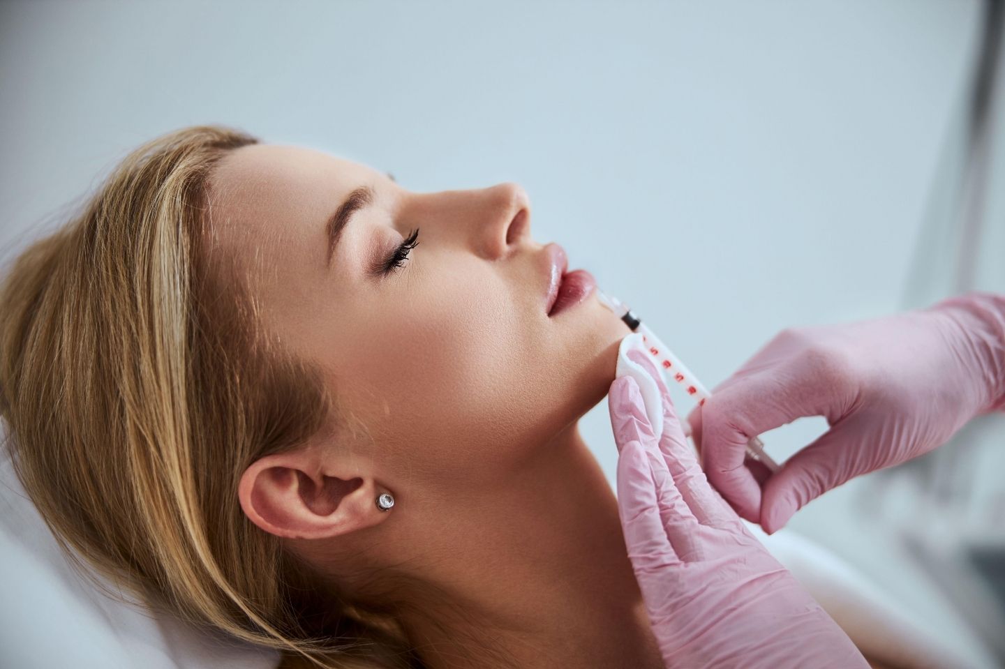 picture of a woman getting filler in her lips